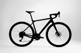Bicicleta de gravel NUEVA ORIGEN en aluminio con tenedor en carbono y grupo Shimano Cues de 2x10 velocidades