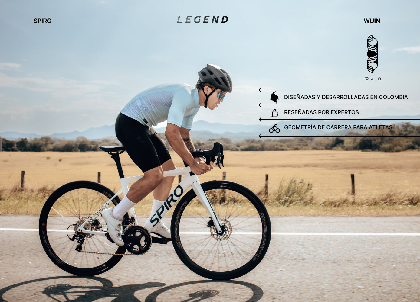 Ciclista en carretera montando una bicicleta de ruta Spiro Legend en carbono, comparada con modelos como Trek Émonda y Scott Addict, diseñada para alto rendimiento en carreras.